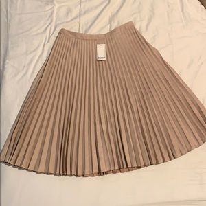 Never worn-  high waisted Bar III beige skirt